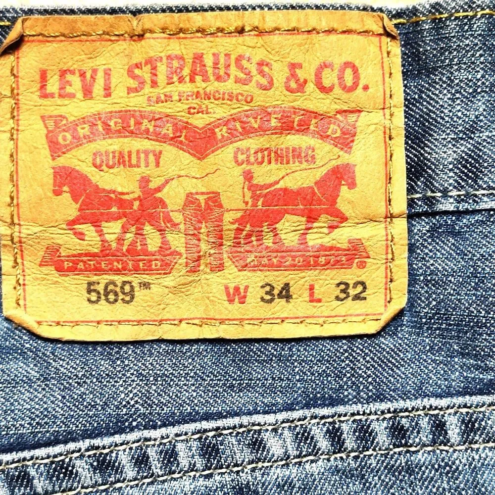 Levi’s 569 Loose Straight Jeans W34 L32 Light Wash Distressed Denim